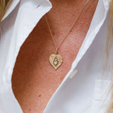 14k Light Yellow Gold Twin Flame Medal and Dangling Heart Moonstone Necklace / CELINE DAOUST