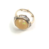 18K NIRVANA Grey Gold Ethiopian Opal Ring with Blue Sapphire and Diamonds / NOOR FARES