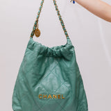 Almond Green 22 Quilted Hobo Bag / CHANEL