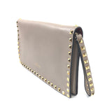 Beige Leather Rockstud Embellished Wristlet Clutch / VALENTINO