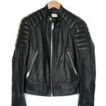 Black leather jacket on a hanger against a white background