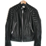 Black leather jacket on a hanger against a white background