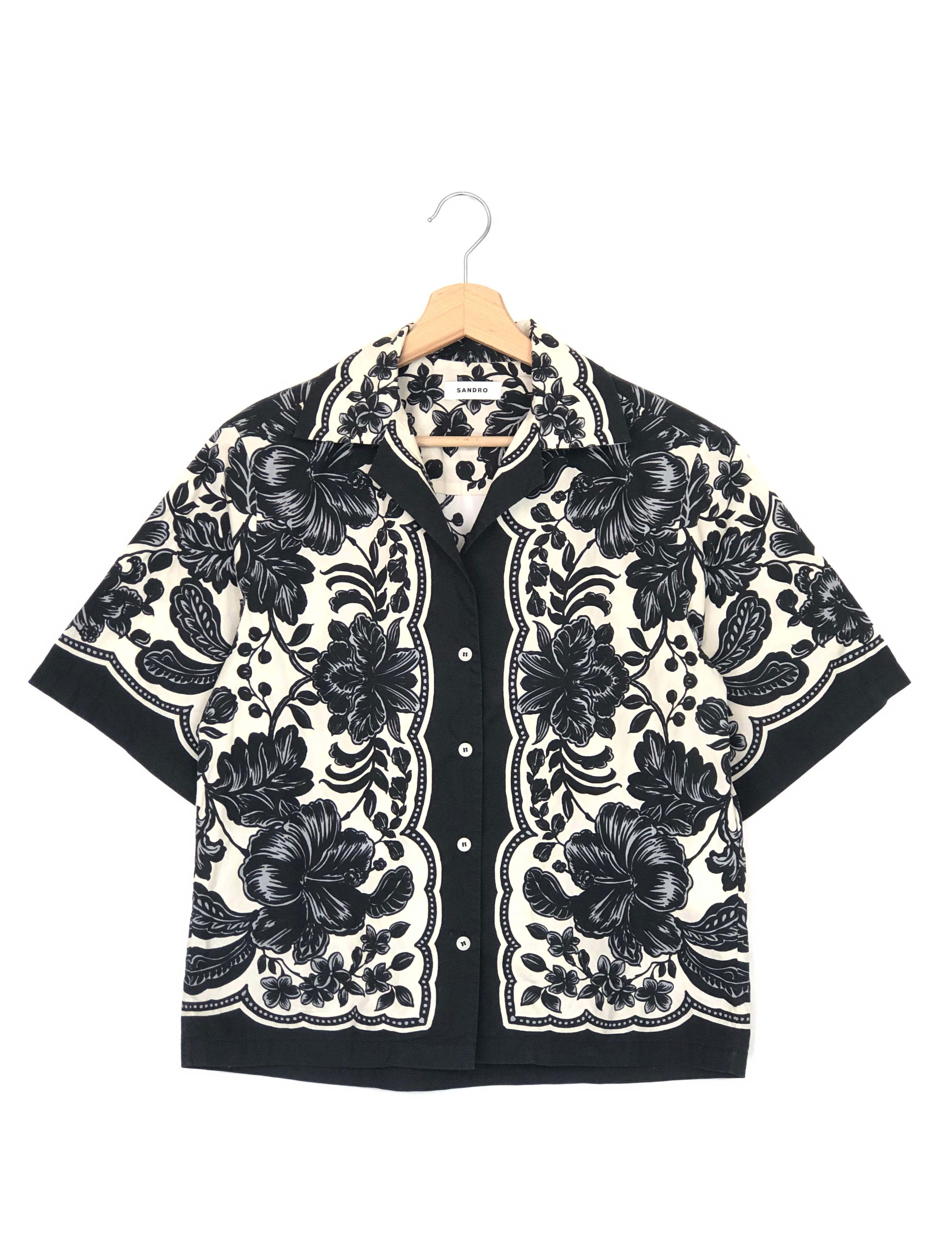 Black and white floral patterned fabric on a white background