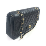 Black Quilted Caviar Medium Classic Double Flap GHW  Bag / CHANEL