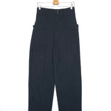 Black pants on a hanger against a white background