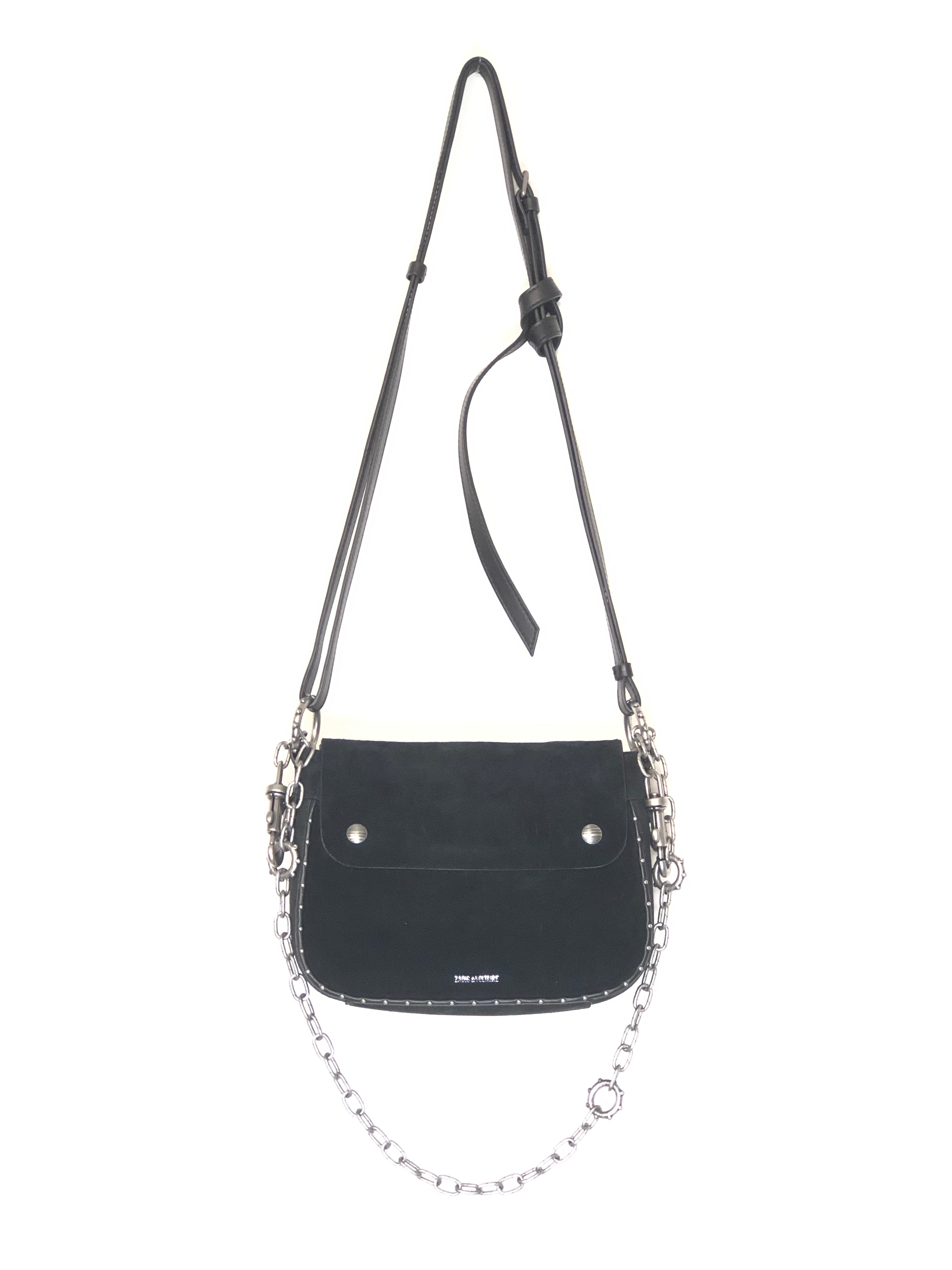 Black crossbody bag with chain detail on a white background