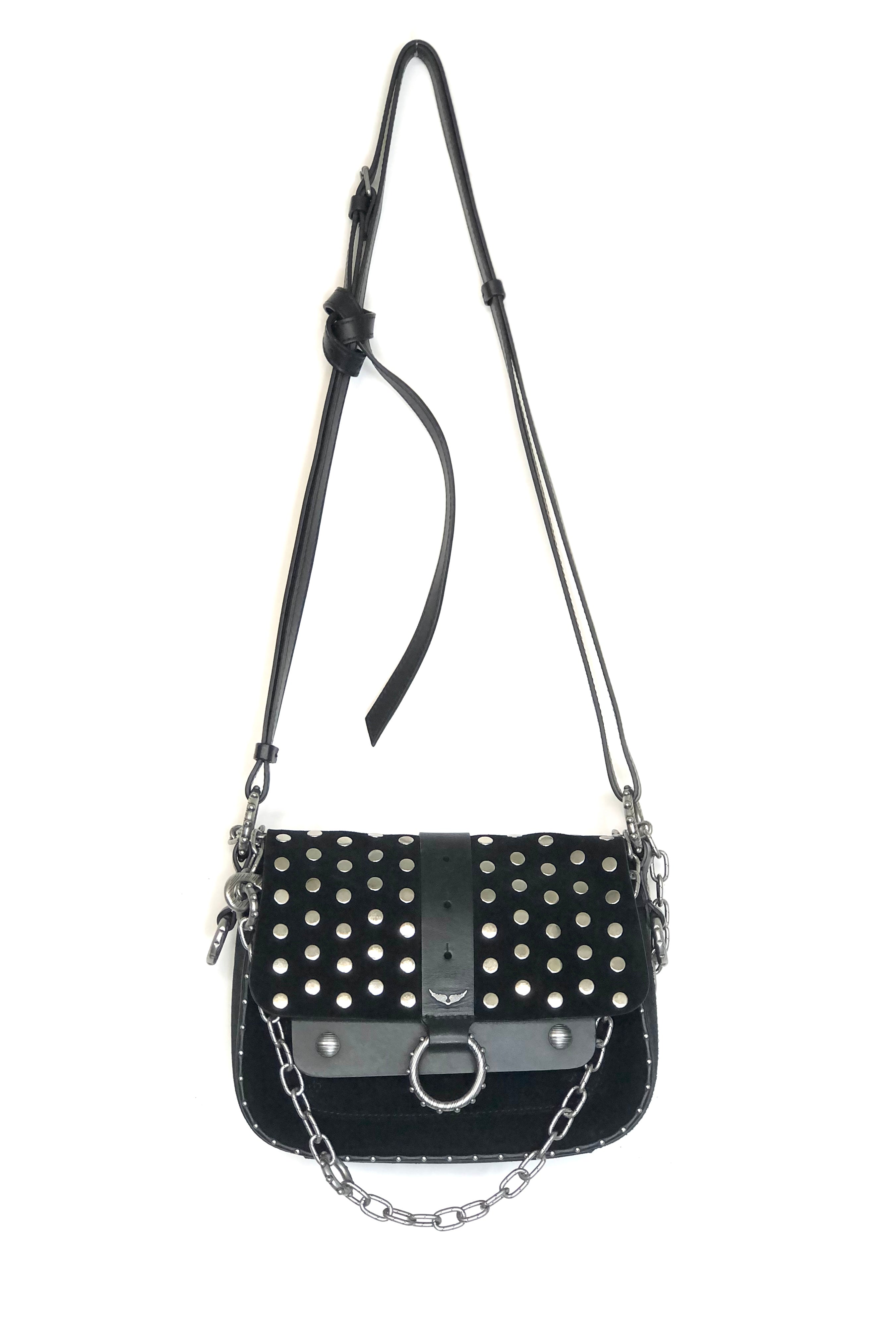 Black studded handbag with chain detail on a white background