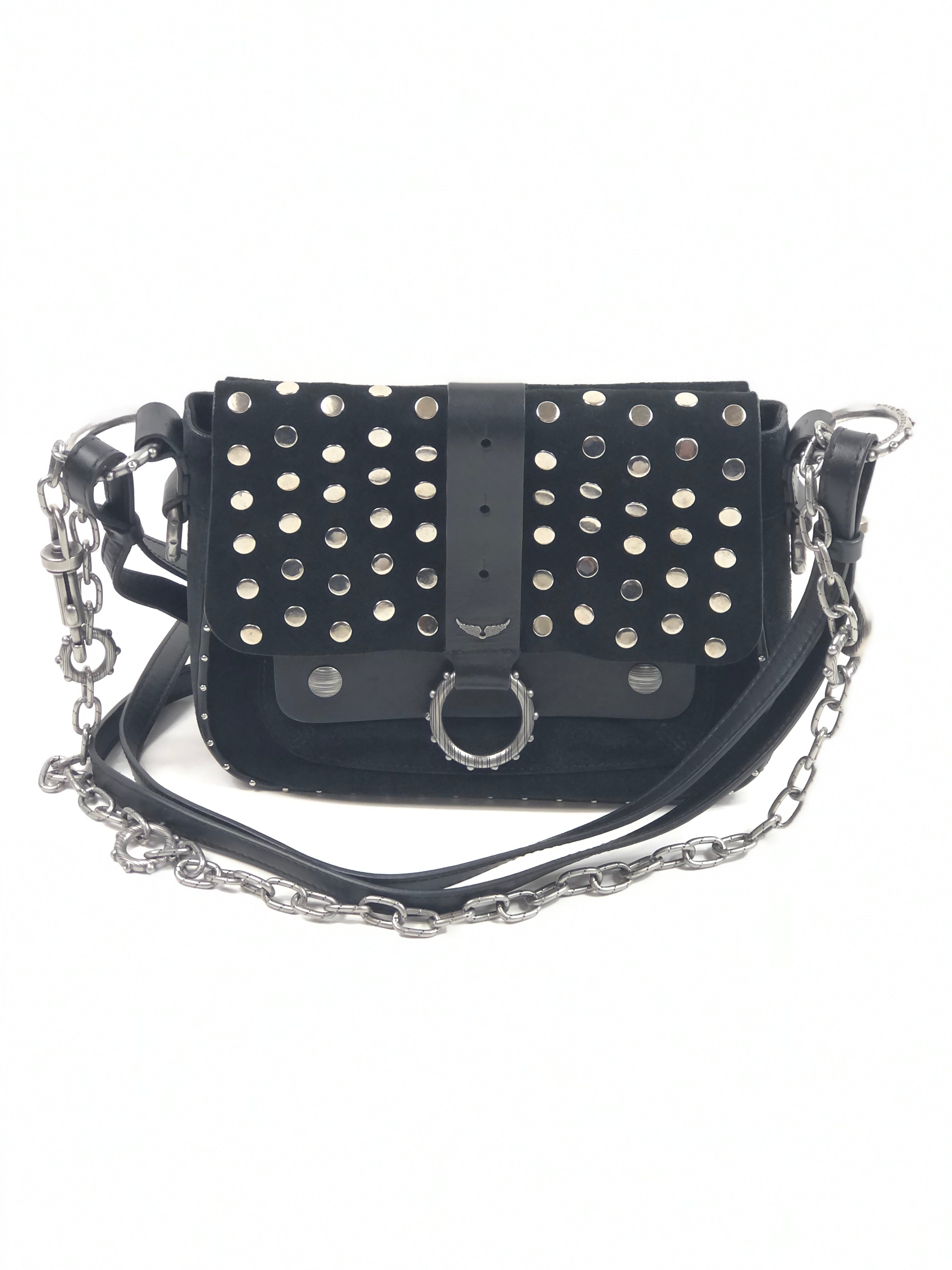 Black studded handbag with a chain strap on a white background
