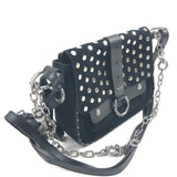Black studded handbag with chain strap on a white background