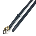 Black leather belt with a gold and silver clasp on a white background