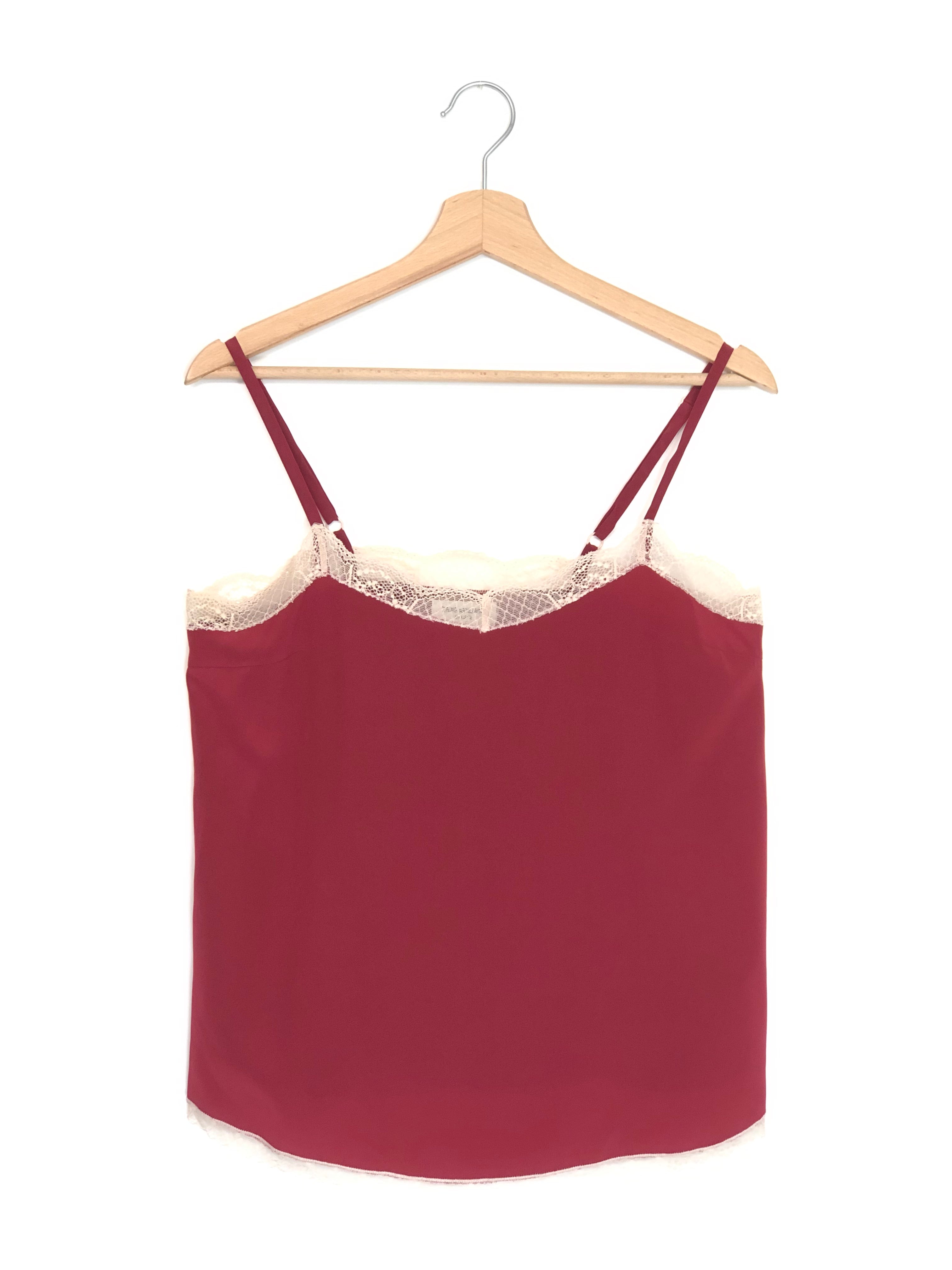 Maroon dress with lace trim on a wooden hanger against a white background