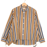 Striped shirt on a hanger against a white background