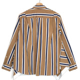 Striped shirt on a hanger against a white background