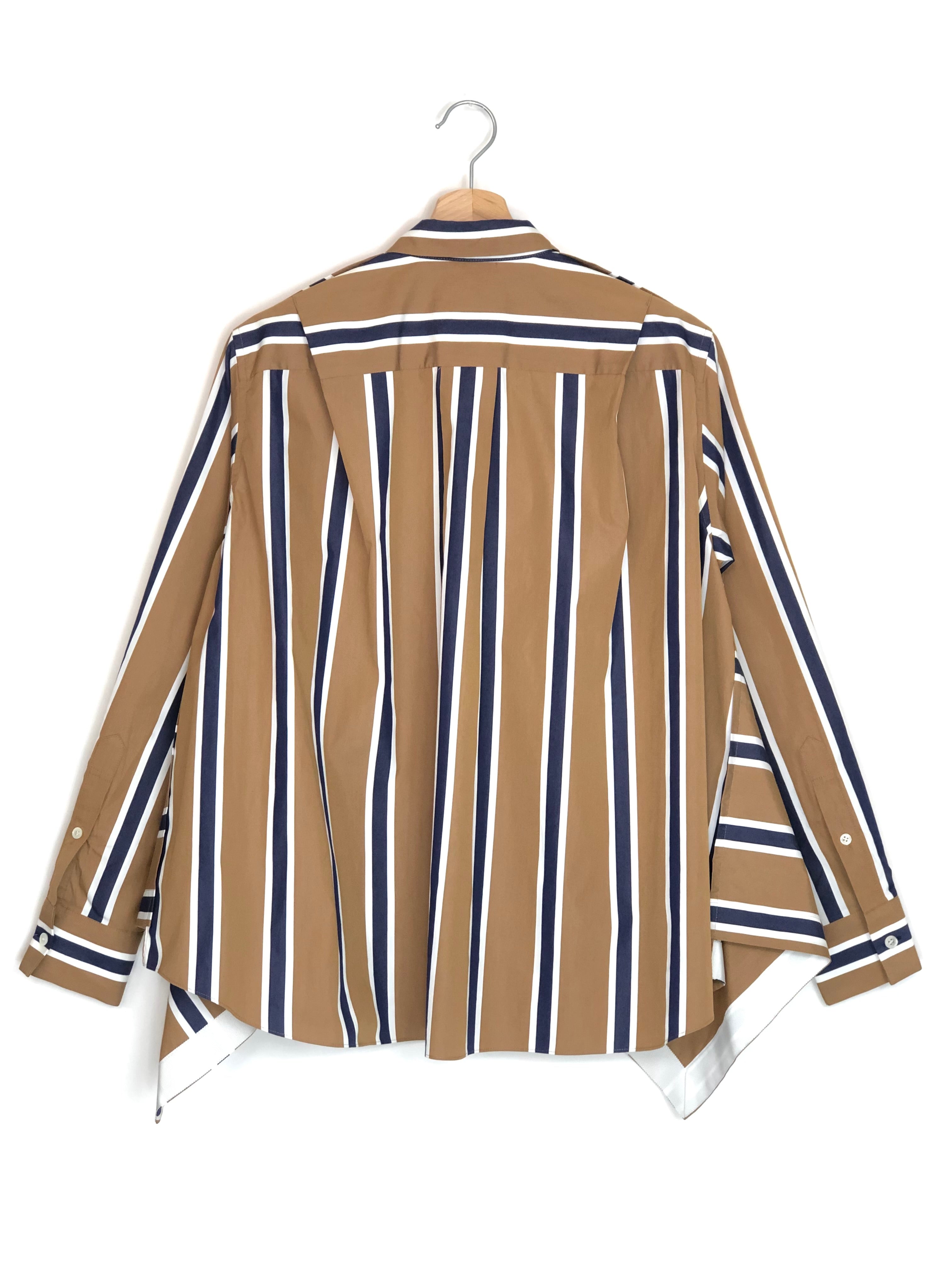 Striped shirt on a hanger against a white background