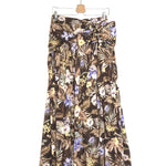 Floral patterned skirt on a hanger against a white background