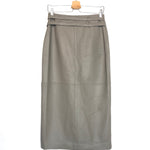 Gray leather skirt on a hanger against a white background