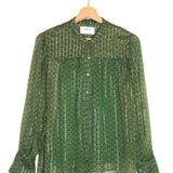 Green textured shirt on a hanger with a white background