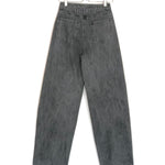 Gray denim pants on a hanger against a white background