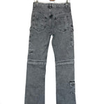 Gray denim jeans on a hanger against a white background