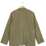 Green jacket on a hanger against a white background