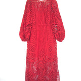 Red lace dress on a hanger against a white background