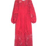 Red lace dress on a hanger against a white background