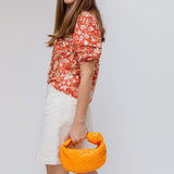 Orange MINI JODIE Intrecciato Nappa Bag / BOTTEGA VENETA