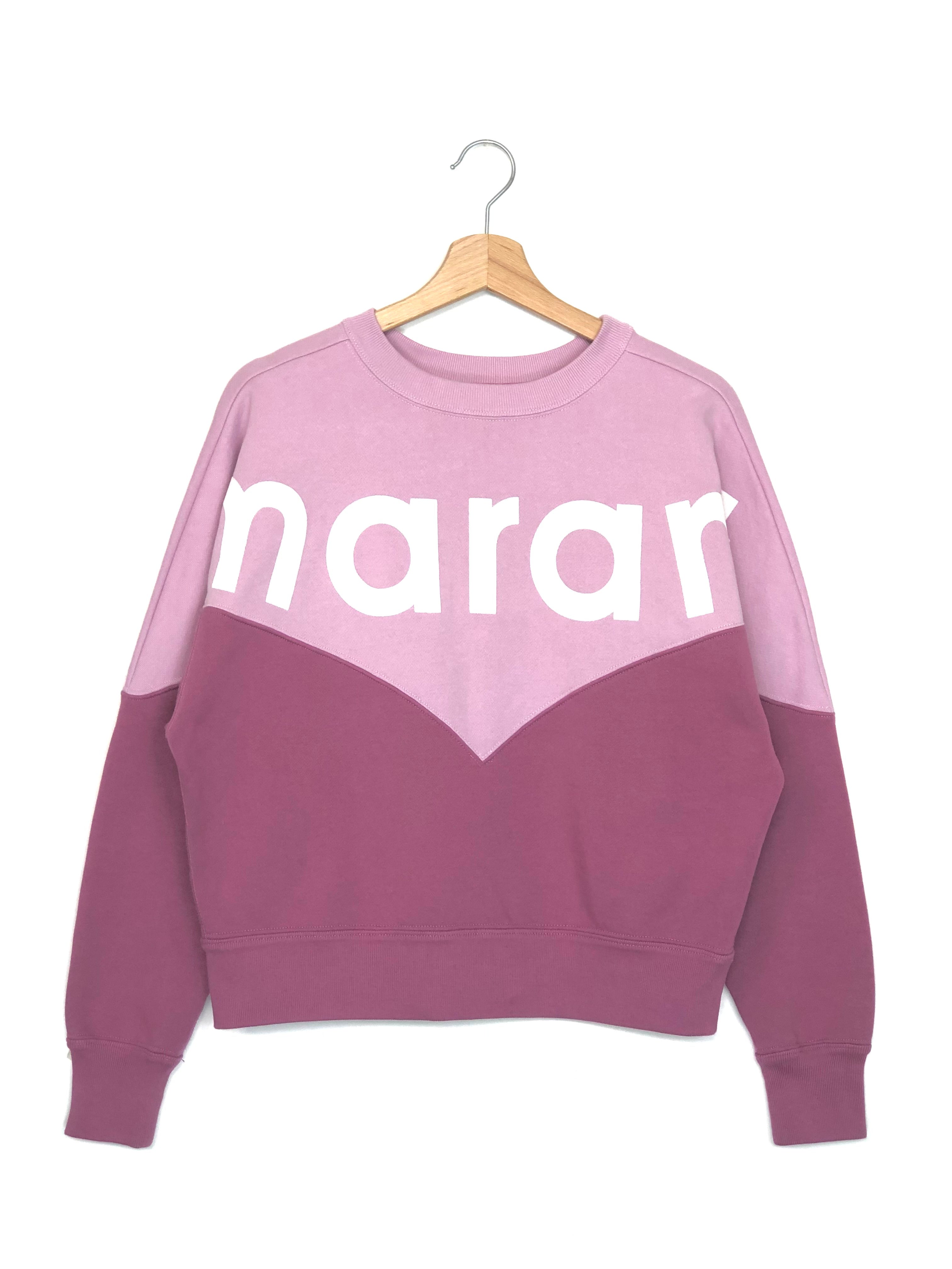 Purple and pink sweatshirt with 'narar' text on a hanger against a white background