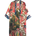 Colorful kimono-style garment with floral and abstract patterns on a white background