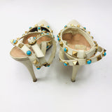 Winter White Pebbled Leather Turquoise Rockstuds 100 Pumps / VALENTINO - Size 38